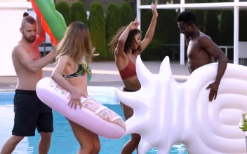 Stock Video Friends Dancing With Floats Beside A Swimming Pool For PC
