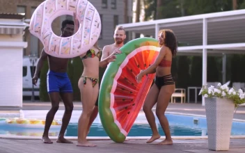 Stock Video Friends Dancing Happily Near A Swimming Pool For PC