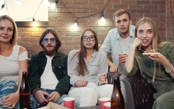 Stock Video Friends Cheer For Win While Watching Tv Competition For PC