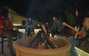 Stock Video Friends Burning Marshmallows Over A Campfire For PC