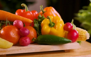 Stock Video Fresh Vegetables On A Wooden Board Close Up View For PC