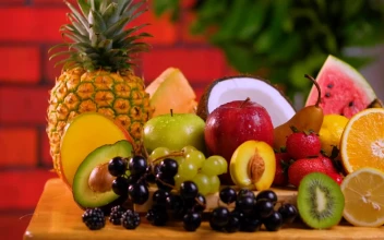 Stock Video Fresh Sliced Fruit Placed On A Table For PC