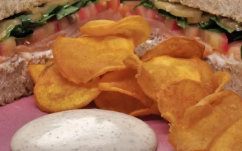 Stock Video French Fries With Dressing And A Halved Sandwich For PC