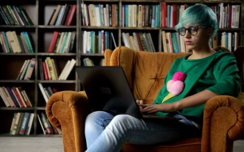 Stock Video Freelancer Working On Her Laptop For PC