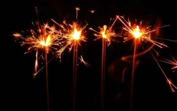 Stock Video Four Sparks Lights Burning In A Dark Place For PC