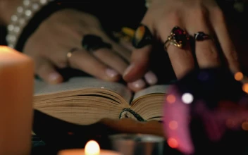 Stock Video Fortune Teller Reading An Ancient Book For PC