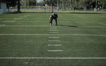 Stock Video Football Player Running To The Camera For PC