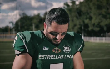 Stock Video Football Player Putting On His Gloves For PC
