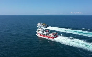 Stock Video Following Two Boats Across The Ocean For PC