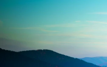 Stock Video Foggy Mountainous Valley In Autumn Time Lapse For PC