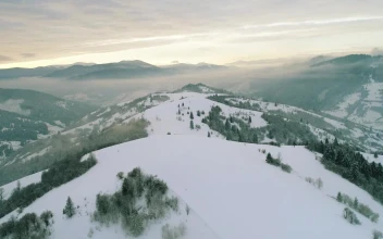 Stock Video Foggy Landscape In A Mountain Range For PC