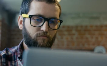 Stock Video Focused Man Watching At Computer For PC