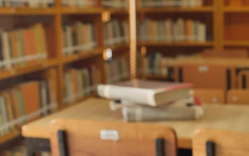 Stock Video Focus On A Stack Of Books In A Library For PC