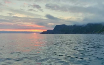 Stock Video Flyover Sea At Sunset Along Mountain Coast For PC