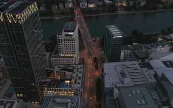 Stock Video Flying Over The Traffic On A Bridge In A River For PC