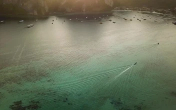 Stock Video Flying Over The Clear Sea Of A Coast In A For PC