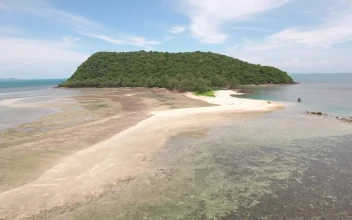 Stock Video Flying Over A Tropical Landscape With An Island For PC