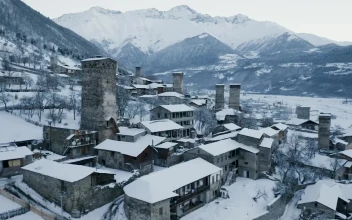 Stock Video Flying Over A Snow Covered Town For PC