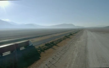 Stock Video Flying Over A Long Highway With Cars And Trucks For PC
