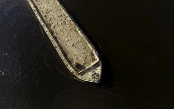 Stock Video Flying Over A Cargo Ship In The River For PC