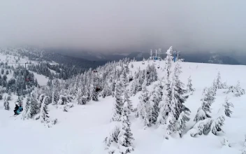 Stock Video Flying Next To The Ski Resort In The Mountains For PC