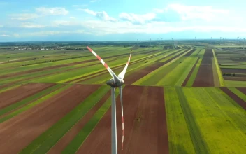 Stock Video Flying Around A Wind Turbine In The Countryside For PC