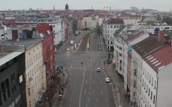 Stock Video Flying An Almost Empty Avenue Of A European City For PC