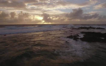 Stock Video Flying Above Waves At Sunset For PC