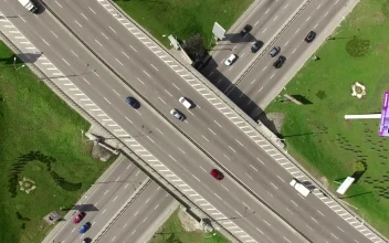 Stock Video Flying Above A Highway Crossing For PC