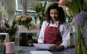 Stock Video Florist Using A Tablet To Take Orders For PC