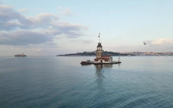 Stock Video Floating Lighthouse On A Sea Coast With Boats For PC