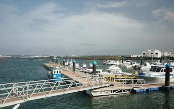 Stock Video Floating Dock With Anchored Boats For PC