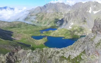 Stock Video Flight In The Rocky Mountains And A Valley With A For PC