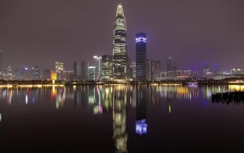 Stock Video Flashing Skyscraper In Shenzhen By A River For PC