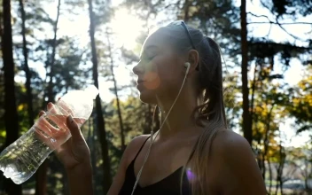 Stock Video Fitness Woman Drinking Water During Her Training For PC