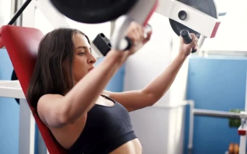 Stock Video Fitness Woman Exercising Her Body In The Gym For PC