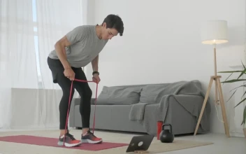 Stock Video Fitness Man Exercising With Elastic Bands For PC