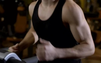 Stock Video Fitness Man Doing Warm Up On The Treadmill For PC