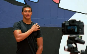 Stock Video Fitness Influencer In Front Of A Camera Giving A Tutorial For PC
