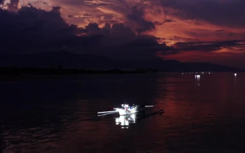 Stock Video Fishing Boats On The Ocean At Dusk For PC