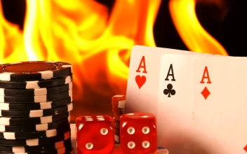 Stock Video Fire Burning Behind Poker Cards Dice And Casino Chips For PC