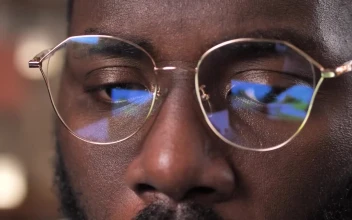 Stock Video Film Reflected On A Pair Of Glasses For PC