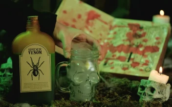 Stock Video Filling A Skull Shaped Glass With Spider Venom For PC