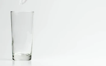 Stock Video Filling A Glass With Ice And Limes For PC