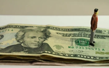 Stock Video Figure Standing On The Dollar For PC