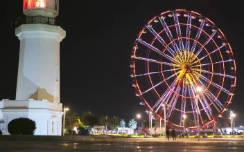 Stock Video Ferris Wheel Near The Lighthouse At Night For PC