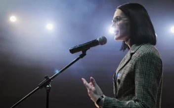 Stock Video Female Speaker Giving A Talk On Stage For PC