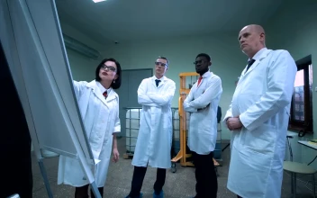 Stock Video Female Scientist Explaining An Idea On The Board For PC
