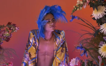 Stock Video Female Gay Man Surrounded By Many Flowers For PC