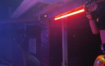 Stock Video Female Fighter Spinning In A Ring To Warm Up For PC